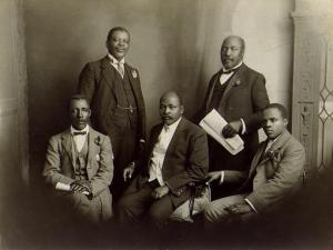 SANNC delegation that went to England to convey African people's objections to the 1913 Land Act, 1914. L-R: Rev W. Rubusana, T. Mapike, Rev J. Dube, S. Plaatjie and S. Msane. Courtesy of South Africa History Online.